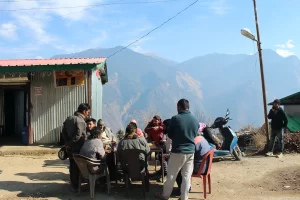 villagers playing carrom in raithal village